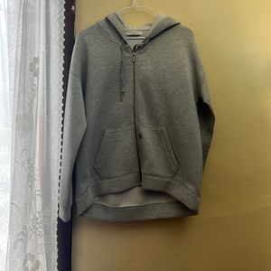 This is a grey pull over jacket.